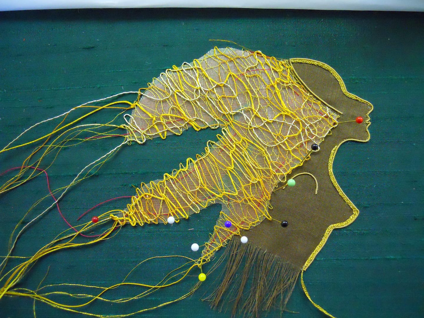 Pinning lace mane on Lion Woman