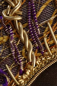 Contemporary s-ing with gold threads