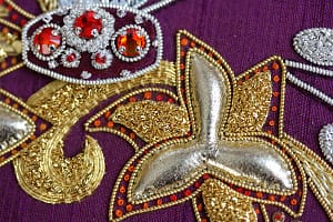 Leather kid, inserted glass beads MEdallion with glass beads, leather gold kid with chipping