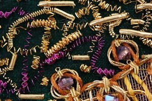 Details of Lion Woman: Bright Check and pearls