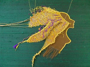 Adding more goldthreads to Lion Woman